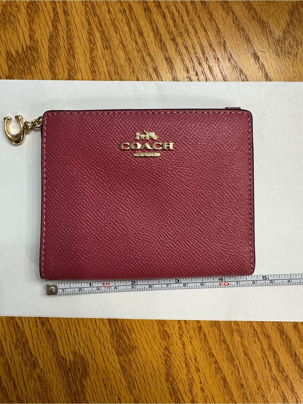 Coach Burgundy Pebbled Leather Zip Card Case with Gold Hardware